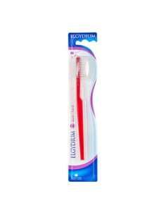 Elgydium brosse à dents...